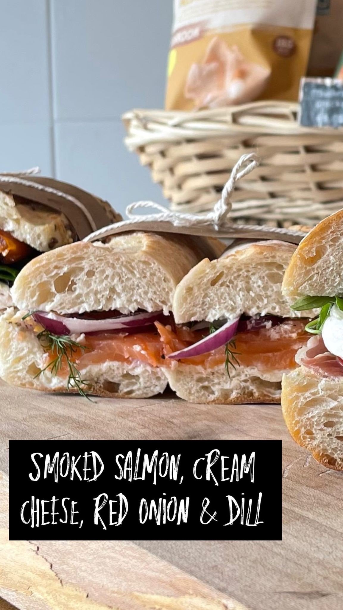 Smoked salmon sandwich with cream cheese, red onion and dill